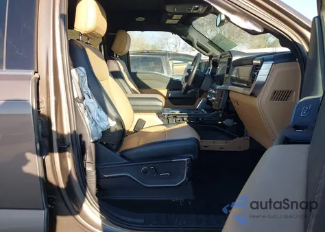 2022 Ford F-150 Lariat z USA, uszkodzony, nr VIN 1FTFW1E84NFA48571